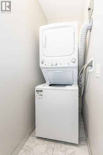 418 - 118 King Street E, Hamilton (Beasley), ON - Indoor Photo Showing Laundry Room