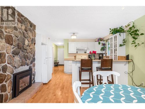 511 Regent Avenue, Enderby, BC - Indoor Photo Showing Other Room With Fireplace