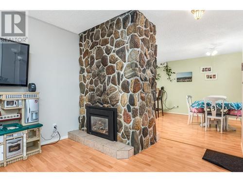 511 Regent Avenue, Enderby, BC - Indoor Photo Showing Living Room With Fireplace