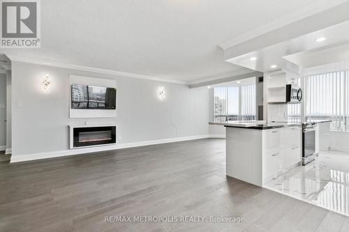 1014 - 1101 Steeles Avenue W, Toronto (Westminster-Branson), ON - Indoor Photo Showing Kitchen With Fireplace