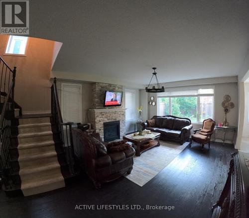 84 Courtney Street, Clarington (Bowmanville), ON - Indoor Photo Showing Living Room With Fireplace