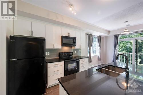 1032 Beryl Private Unit#E, Ottawa, ON - Indoor Photo Showing Kitchen With Double Sink