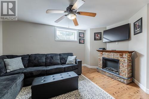 13 Mccourt Close, Conception Bay South, NL - Indoor Photo Showing Living Room With Fireplace