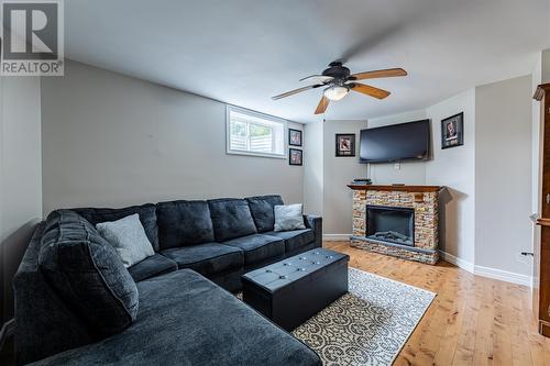 13 Mccourt Close, Conception Bay South, NL - Indoor Photo Showing Living Room With Fireplace