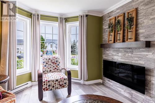 13 Mccourt Close, Conception Bay South, NL - Indoor Photo Showing Living Room With Fireplace