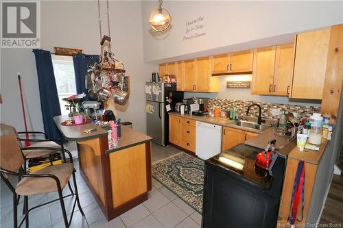 518 Route 776, Grand Manan, NB - Indoor Photo Showing Kitchen With Double Sink