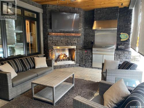 3035 Quinn Drive, Regina, SK - Indoor Photo Showing Living Room With Fireplace