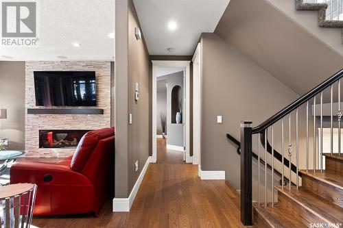 3035 Quinn Drive, Regina, SK - Indoor Photo Showing Other Room With Fireplace