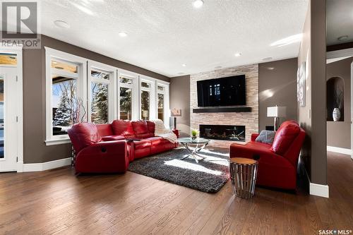 3035 Quinn Drive, Regina, SK - Indoor Photo Showing Living Room With Fireplace