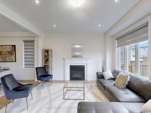 16 Morningstar Ave, Whitby, ON - Indoor Photo Showing Living Room With Fireplace