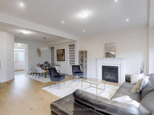 16 Morningstar Ave, Whitby, ON - Indoor Photo Showing Living Room With Fireplace