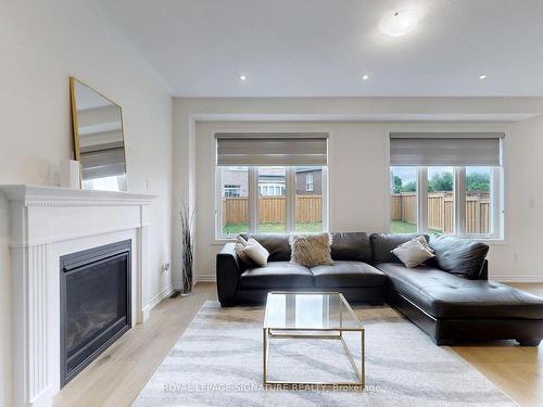 16 Morningstar Ave, Whitby, ON - Indoor Photo Showing Living Room With Fireplace