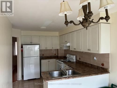 40 - 2275 Credit Valley Road, Mississauga, ON - Indoor Photo Showing Kitchen With Double Sink