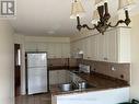 40 - 2275 Credit Valley Road, Mississauga, ON  - Indoor Photo Showing Kitchen With Double Sink 