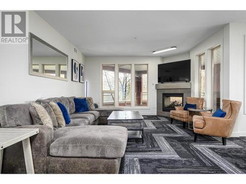 7343 Okanagan Landing Road Unit# 1101, Vernon, BC - Indoor Photo Showing Living Room With Fireplace