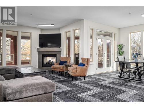 7343 Okanagan Landing Road Unit# 1101, Vernon, BC - Indoor Photo Showing Living Room With Fireplace