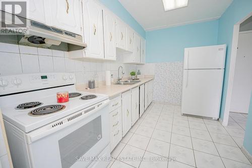 106 - 1050 Stainton Drive, Mississauga (Erindale), ON - Indoor Photo Showing Kitchen With Double Sink