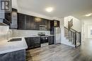 1 - 120 Court Drive S, Brant, ON  - Indoor Photo Showing Kitchen With Double Sink With Upgraded Kitchen 