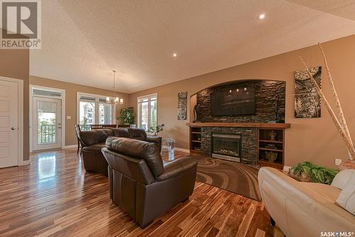 5729 Devine Place, Regina, SK - Indoor Photo Showing Living Room With Fireplace