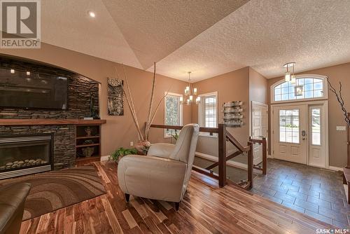 5729 Devine Place, Regina, SK - Indoor Photo Showing Living Room With Fireplace