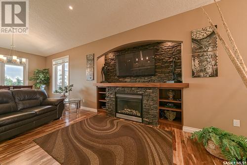 5729 Devine Place, Regina, SK - Indoor Photo Showing Living Room With Fireplace