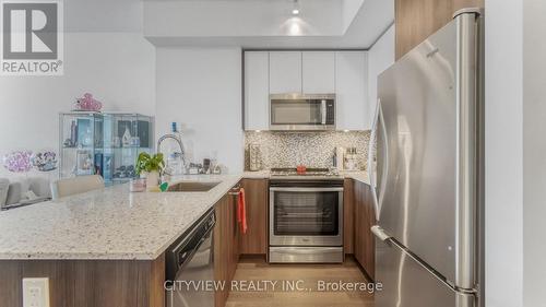 3208 - 20 Shore Breeze Drive, Toronto (Mimico), ON - Indoor Photo Showing Kitchen With Upgraded Kitchen