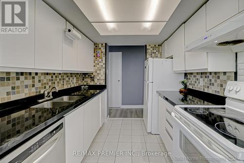 605 - 3 Rowntree Road, Toronto (Mount Olive-Silverstone-Jamestown), ON - Indoor Photo Showing Kitchen With Double Sink