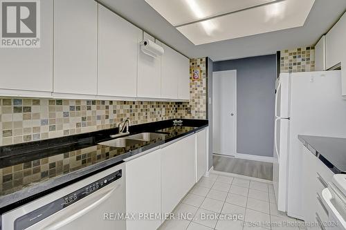 605 - 3 Rowntree Road, Toronto (Mount Olive-Silverstone-Jamestown), ON - Indoor Photo Showing Kitchen With Double Sink