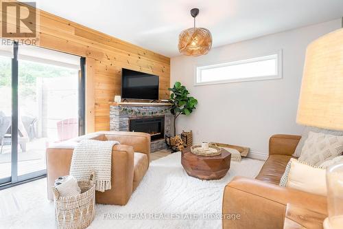 107 Revell Street, Gravenhurst, ON - Indoor Photo Showing Living Room With Fireplace