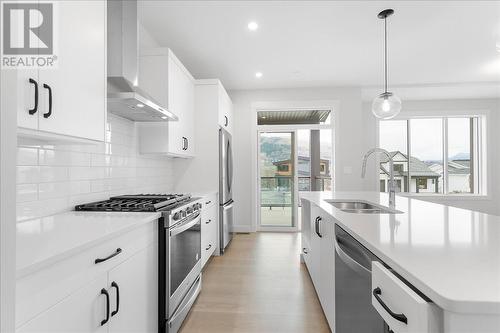 309 Arrowleaf Rise, Coldstream, BC - Indoor Photo Showing Kitchen With Double Sink With Upgraded Kitchen