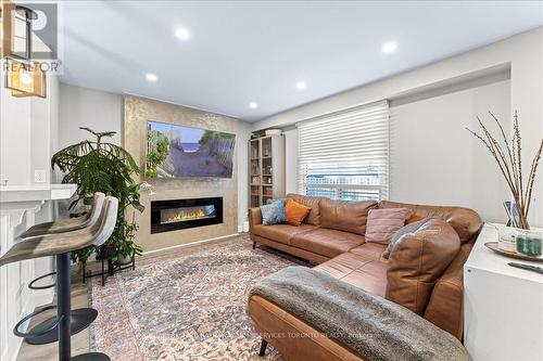 11 - 98 Falconer Drive, Mississauga (Streetsville), ON - Indoor Photo Showing Living Room With Fireplace