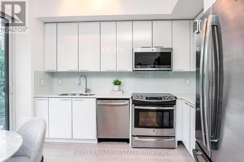 313 - 10 Park Lawn Road, Toronto (Mimico), ON - Indoor Photo Showing Kitchen With Double Sink With Upgraded Kitchen