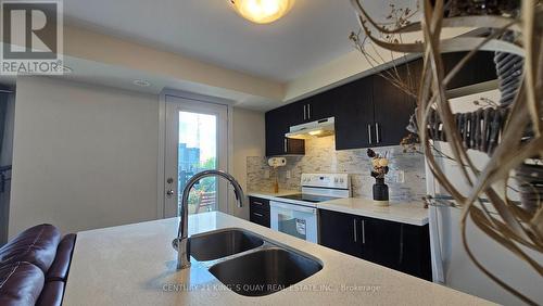 2104 - 2 Westmeath Lane, Markham (Cornell), ON - Indoor Photo Showing Kitchen With Double Sink