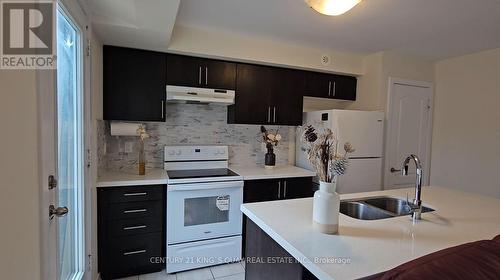 2104 - 2 Westmeath Lane, Markham (Cornell), ON - Indoor Photo Showing Kitchen With Double Sink