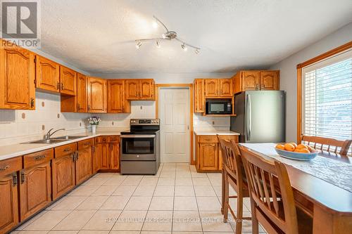 2139 Adjala-Tecumseth Townline, New Tecumseth, ON - Indoor Photo Showing Kitchen With Double Sink