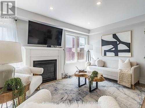 4885 Capri Crescent, Burlington (Alton), ON - Indoor Photo Showing Living Room With Fireplace