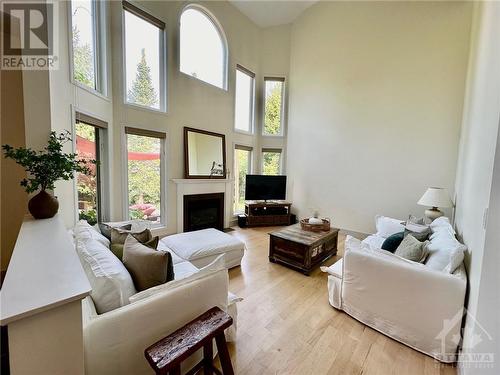 114 Strathcarron Crescent, Ottawa, ON - Indoor Photo Showing Living Room With Fireplace