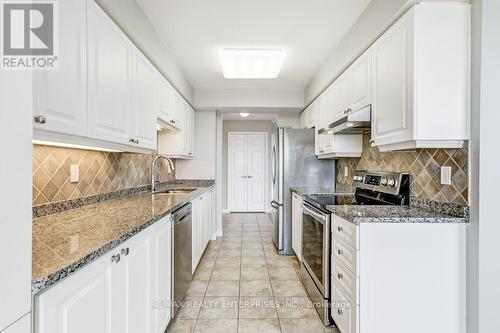 1824 - 25 Kingsbridge Garden Circle, Mississauga (Hurontario), ON - Indoor Photo Showing Kitchen With Upgraded Kitchen