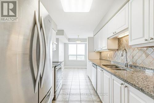 1824 - 25 Kingsbridge Garden Circle, Mississauga (Hurontario), ON - Indoor Photo Showing Kitchen With Double Sink With Upgraded Kitchen