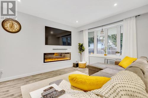 6 Rossford Crescent, Kitchener, ON - Indoor Photo Showing Living Room With Fireplace