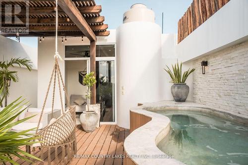 301C - Luz Chemuyil Street W, Mexico, ON -  Photo Showing Other Room With In Ground Pool