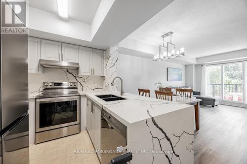 2042 - 3033 Finch Avenue W, Toronto (Humbermede), ON - Indoor Photo Showing Kitchen With Stainless Steel Kitchen With Double Sink With Upgraded Kitchen