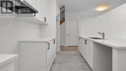 9 Primrose Heights, Adjala-Tosorontio, ON - Indoor Photo Showing Kitchen With Double Sink