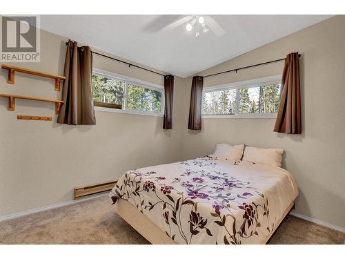 5040 Meier Sub Road, Cluculz Lake, BC - Indoor Photo Showing Bedroom