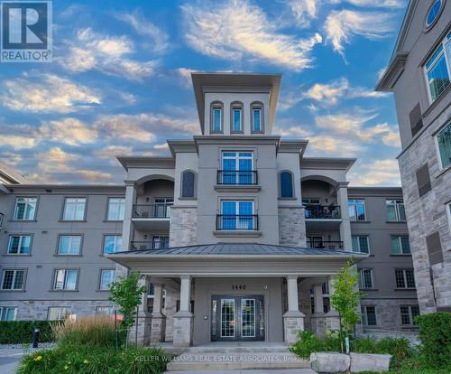 110 - 1440 Main Street E, Milton (Dempsey), ON - Outdoor With Balcony With Facade