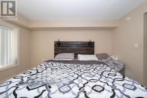 110 - 1440 Main Street E, Milton (Dempsey), ON - Indoor Photo Showing Bedroom