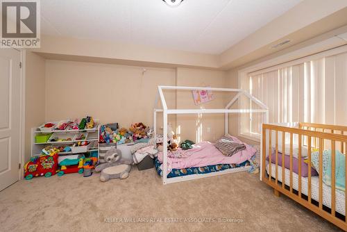 110 - 1440 Main Street E, Milton (Dempsey), ON - Indoor Photo Showing Bedroom