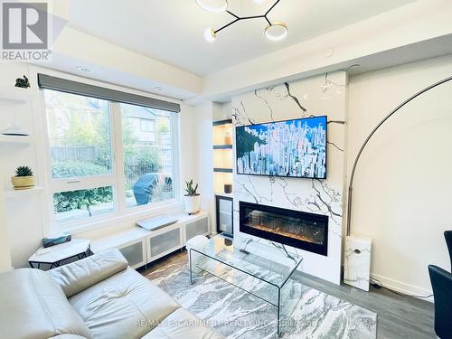 109 - 2530 Eglinton Avenue W, Mississauga (Central Erin Mills), ON - Indoor Photo Showing Living Room With Fireplace