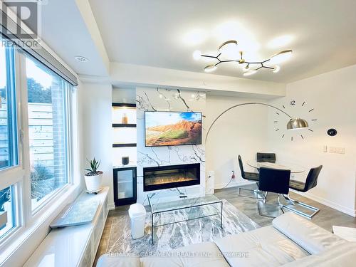 109 - 2530 Eglinton Avenue W, Mississauga (Central Erin Mills), ON - Indoor With Fireplace