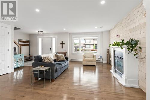 64 Satara Drive, Moncton, NB - Indoor Photo Showing Living Room With Fireplace